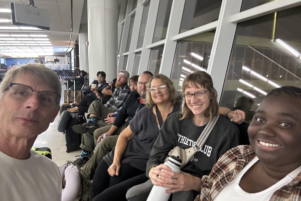 Checked in and waiting to board our flight